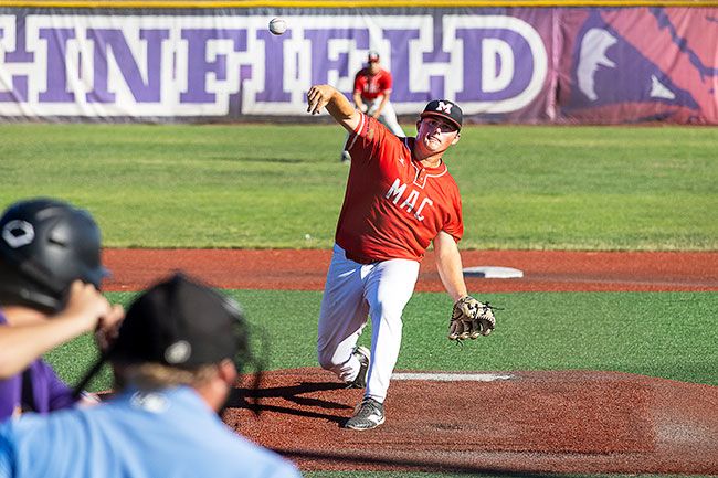 Nathan Ecker/News-Register##Sam Steele hurls a pitch to home plate in his start versus Columbia River. The incoming senior threw the second-most innings (21) of anyone over the summer, working to an ERA of 4.67 while striking out 23 batters and allowing just nine walks. His ability to force weak contact helped him escape dangerous situations. Nathan Ecker/News-Register##Sam Steele hurls a pitch to home plate in his start versus Columbia River. The incoming senior threw the second-most innings (21) of anyone over the summer, working to an ERA of 4.67 while striking out 23 batters and allowing just nine walks. His ability to force weak contact helped him escape dangerous situations.