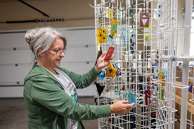 Rusty Rae/News-Register##While she has been involved with art since childhood, Holly Juttelstad calls her current interest in glass fusion &ldquo;a hobby.&rdquo; She is learning to make artistic bowls, plates and hanging decorations with her kiln.