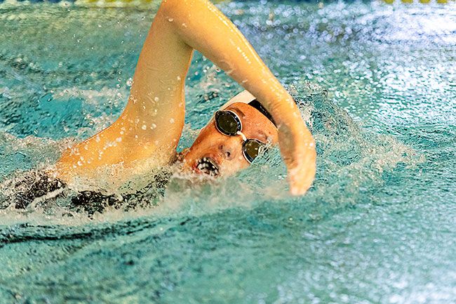 Nathan Ecker/News-Register##Addie Withee battles for position in the girls’ 200-yard freestyle, framing herself in the catch of her stroke. Withee placed sixth in the event at 2:33.36 as the highest finishing Mako swimmer. Her highest personal placement came in the 100-yard freestyle, where she placed second in 1:06.60. Withee also competed in the 50-yard backstroke (3rd, 35.26), 50-yard breaststroke, 50-yard backstroke, 50-yard butterfly and was the last leg of the 200-yard medley relay. Nathan Ecker/News-Register##Addie Withee battles for position in the girls’ 200-yard freestyle, framing herself in the catch of her stroke. Withee placed sixth in the event at 2:33.36 as the highest finishing Mako swimmer. Her highest personal placement came in the 100-yard freestyle, where she placed second in 1:06.60. Withee also competed in the 50-yard backstroke (3rd, 35.26), 50-yard breaststroke, 50-yard backstroke, 50-yard butterfly and was the last leg of the 200-yard medley relay.