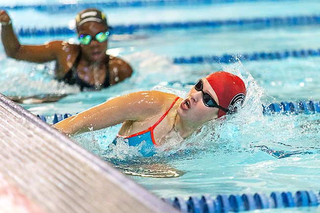 Nathan Ecker/News-Register##Gisele Martins makes her turn into the home stretch of the girls’ 100-yard individual medley. She ultimately placed fifth with a time of 1:10.80. Martins later placed side by side with Cate Shea in the 50-yard freestyle. Shea took first in 27.11, while Martins claimed second-place less than a length behind her teammate in 27.26. Nathan Ecker/News-Register##Gisele Martins makes her turn into the home stretch of the girls’ 100-yard individual medley. She ultimately placed fifth with a time of 1:10.80. Martins later placed side by side with Cate Shea in the 50-yard freestyle. Shea took first in 27.11, while Martins claimed second-place less than a length behind her teammate in 27.26.