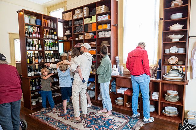Rusty Rae/News-Register##Customers on the Lucky Duck&rsquo;s first day browse merchandise that includes many items used at the Hayward restaurant and in the kitchens of the owners.