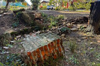 Racheal Winter/News-Register file photo##A 24-foot historic wall in McMinnville City Park was damaged in a 2025 car accident.