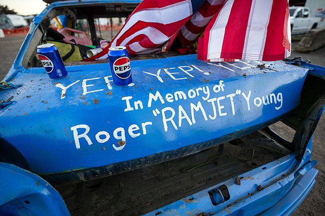 Rachel Thompson/News-Register##After the derby, a battered Pepsi-themed car driven by Dylan Spindler sits in tribute to his grandfather, Roger &ldquo;Ramjet&rdquo; Young, a longtime driver and organizer remembered for helping keep the derby tradition alive and lending a hand whenever someone needed one. Young, who died earlier this year, was honored at the opening of Summertime Smash and was known for greeting visitors to his towing yard with, &ldquo;Hey kid, you want a Pepsi?&rdquo;