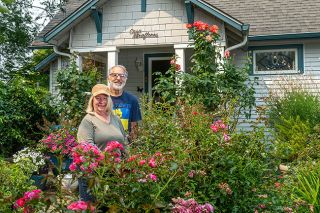 Rusty Rae/News-Register##At Casa Miraflores, flowers and vegetables live in harmony. Owners Tamara Chilla, the flower person, and Jan Messinger, who is responsible for vegetables and infrastructure, enjoy their combined garden. Jan gave his wife the &ldquo;Casa Miraflores&rdquo; sign that now hangs above the front porch.