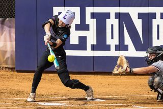 Nathan Ecker/News-Register file photo##Meara Sain smashes one of three hits into the field during the Wildcats&rsquo; NCAA McMinnville Regional winning game versus Transylvania University on May 16.