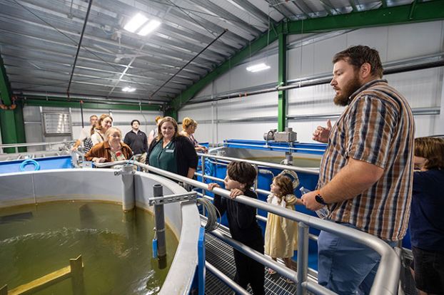 Rachel Thompson/News-Register##Amity City Manager Nathan Frarck gives community members, elected officials and partners a tour of the new water treatment plant on Saturday. The project cost is estimated at $11.5 million. &ldquo;This upgrade has made it a lot easier to produce water,&rdquo; he said.