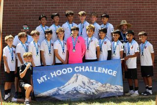 Photo courtesy of McMinnville Soccer Club##The McMinnville Soccer Club U14 Red team poses with their Mt. Hood Challenge medals after a 4-1 victory over Bend FC Gold. Scott Peterson&rsquo;s squad played strong on both sides of the pitch to claim wide-margins over their opponents.