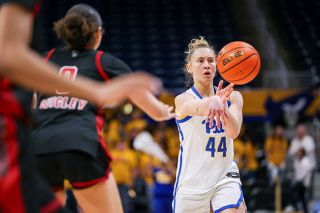 Photo courtesy of Pitt Athletics##Macie Arzner makes a pass in the University of Pittsburgh s season finale against North Carolina State on March 1 at the Peterson Events Center in Pittsburgh, Pennsylvania.