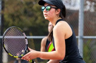 Nathan Ecker/News-Register file photo##Madeleine Hendricks, a 2026 graduate of McMinnville High School, plays close to the net in a staggered doubles position with teammate Caroline Rickards in a spring match versus Newberg at Cowls Courts. The duo lost just one regular season match together, helping the Grizzlies tie for the second most team victories (15) by any Oregon high school this past season.