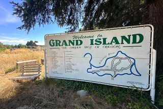 Kirby Neumann-Rea/News-Register##&ldquo;Welcome&rdquo; sign and keyed map stands just before the Lambert Slough bridge.