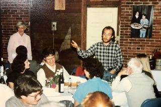 Submitted photo##On Sept. 25, 1987, Lorre and Kirby Neumann-Rea listen as their friend Lee Krahenbuhl presents a rehearsal dinner toast in the pre-Backroom at Nick&rsquo;s Italian Cafe. Photo on the wall is Nick&rsquo;s daughters, Aida and Carmen.