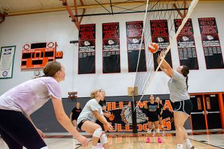 Emily Bonsant/News-Register##At Willamina Volleyball practice varsity players Elizabeth Neese, Keylee Manley and Emma Brunner at the front line and Grace Terbush, further back, prepare for the set by Assistant Coach Madison Diehl. Alongside the coaches are Nahliya Santos and Briar Clemmer.