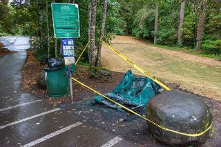 Ossie Bladine/News-Register##The remains of a porta potty at Kiwanis Park in Southeast McMinnville that was destroyed by a suspected arson fire Saturday were expected to be removed Wednesday or Thursday, according to Public Works Superintendent David Renshaw.