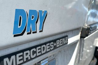 Kirby Neumann-Rea/News-Register##The &ldquo;DRY&rdquo; decal seen in McMinnville, OOF DAH and IN DEBT vehicle plates, an OJ plate raises questions, the singular Neil Young bumper sticker, placard and &lsquo;old &lsquo;55&rsquo; at Cruising McMinnville and &ldquo;No Turnaround&rdquo; sign.