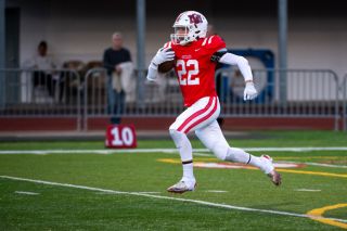 Rusty Rae/News-Register##Sophomore Bradley Woodward streaks down field on his 96-yard kickoff return to swing momentum back in the Grizzlies favor during their 34-22 victory over Beaverton on Friday, Sept. 4, at Wortman Stadium.