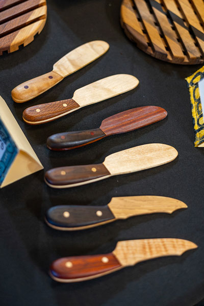 Rachel Thompson/News-Register##Handcrafted wooden spreaders by Kenn Conger of McMinnville combine exotic hardwoods in a variety of shapes and finishes. Conger, a first-time Art Harvest Studio Tour artist, describes his work as existing between art and craft: &ldquo;Don&rsquo;t just stand there, take up this beautiful object and put it to use.&rdquo;