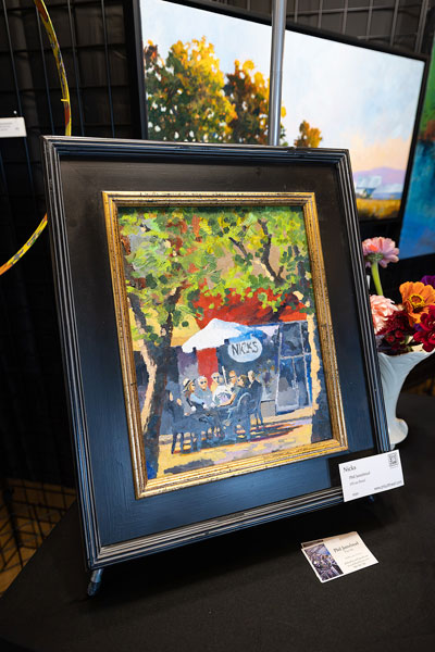 Rachel Thompson/News-Register##A familiar McMinnville scene takes shape in Phil Juttelstad&rsquo;s &ldquo;Nick&rsquo;s,&rdquo; an oil-on-panel painting depicting patrons gathered outside the now-closed Nick&rsquo;s Italian Cafe on Third Street.