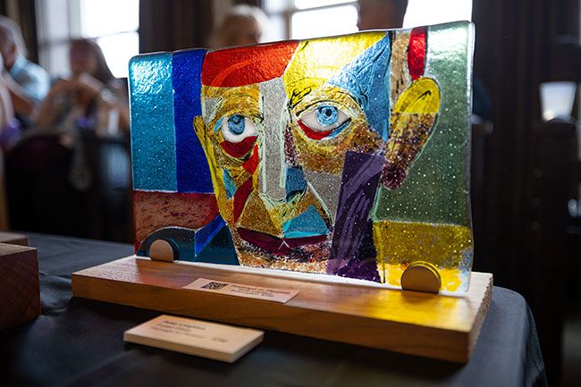 Rachel Thompson/News-Register##Light shines through &ldquo;Homage to Picasso,&rdquo; a fused-glass work by Peter Leighton of Dundee, on display at Rose of Third Street, 516 N.E. Third St.