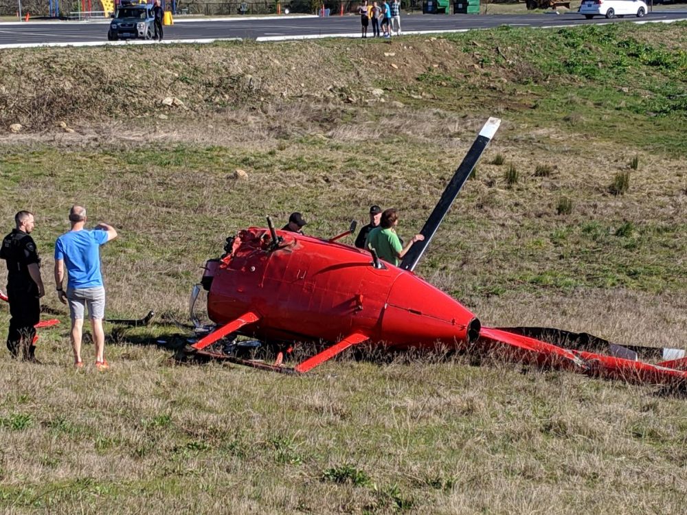 Photos courtesy Newberg-Dundee Police Department##The pilot and passenger - brothers - were uninjured when their helicopter crashed Sunday afternoon in rural Newberg.