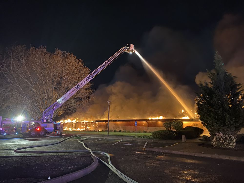 Firefighters poured thousands of gallons of water on the two-alarm dental business blaze.