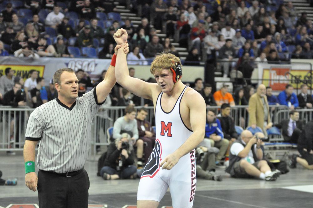 Robert Husseman/News-Register##McMinnville junior Brian Barnes won the Class 6A 220-pound individual state title at the OSAA State Wrestling Championships Saturday evening at Veterans Memorial Coliseum in Portland.
