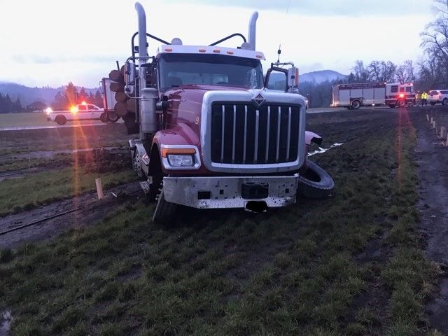 Southwest Polk Fire District photo##A Grand Ronde woman was killed Tuesday morning when the car she was driving collided with a loaded log truck on Highway 22 in Polk County.