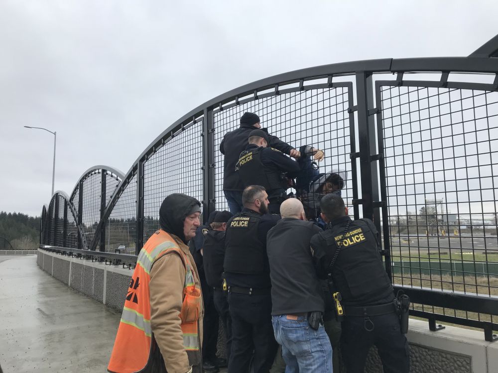 Submitted photos##Newberg-Dundee police, along with other agencies, prevented a woman from leaping off the Newberg-Dundee Bypass Wednesday afternoon.