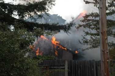 Kirby Neumann-Rea/News-Register##Fire heavily damaged the Oxford House, a recovery center, and displaced several residents Tuesday afternoon.