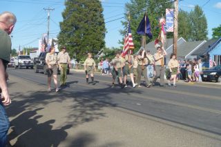 Paul Daquilante/News-Regiter##Scout Troop 245 leads the way at the start of Monday night s parade down Main Street prior to a fireworks show at dusk that wrapped up the Willamina Old-Fashioned Fourth of July Celebration.