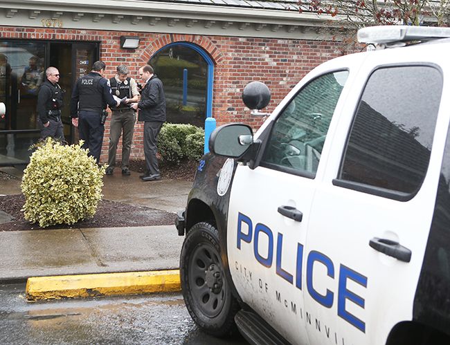 Rockne Roll/News-Register##
McMinnville police respond to a robbery at Chase Bank in McMinnville on Tuesday, Jan. 10.