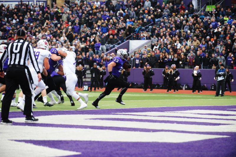 Courtesy of Rusty Rae##St. Thomas running back Jordan Roberts (23) carried the ball 33 times for 256 yards and three touchdowns Saturday against Linfield.