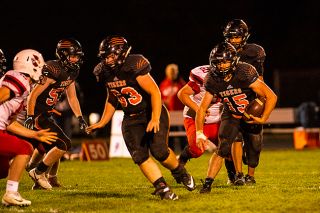 Rusty Rae/News-Register##
Yamhill-Carlton running back Owen Amerson (15) breaks off a big run against Corbett. Rusty Rae/News-Register##
Yamhill-Carlton running back Owen Amerson (15) breaks off a big run against Corbett.