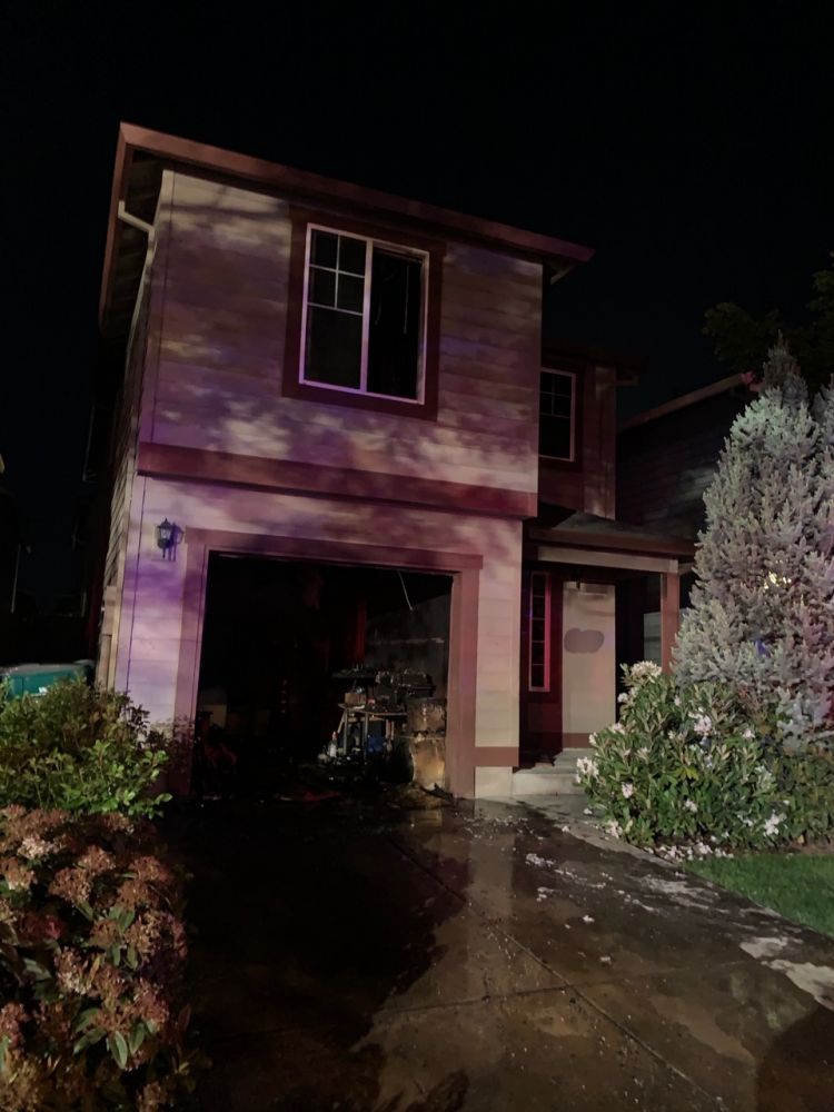 Tualatin Valley Fire & Rescue photo##Five adults escaped a burning Newberg residence late Sunday night.