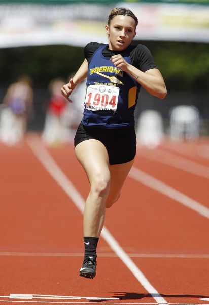 Rockne Roll/News-Register##
Sheridan s Ronni VanZant races in the girls  100m.