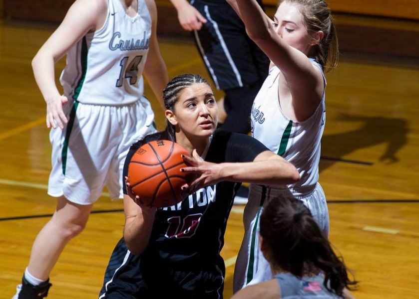 Rockne Roll/News-Register##
Dayton s Kalina Rojas drives for a tough lay-in against a Salem Academy defender.