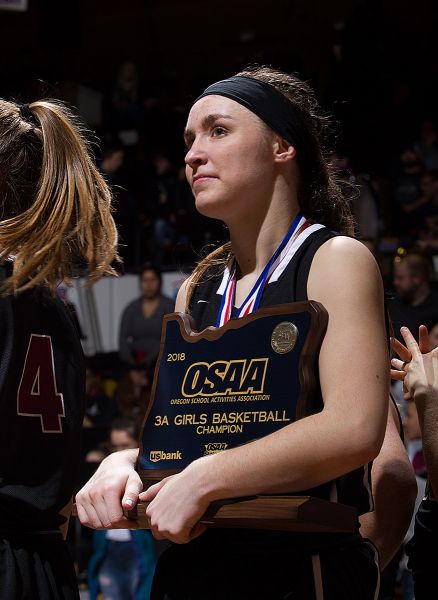 Rockne Roll/News-Register##
Dayton point guard Shawnie Spink holds the Pirates  3A state title.