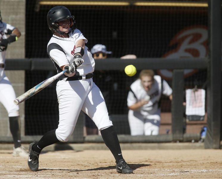 Rockne Roll/News-Register##
Dayton s Catie Jacks hits a game-tying home run in the fifth inning of the Pirates  OSAA Class 3A state title game against Rainier Friday, June 1, at Oregon State University in Corvallis.