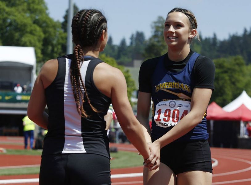 Rockne Roll/News-Register##
Sheridan s Ronni VanZant after her 100m preliminary race.