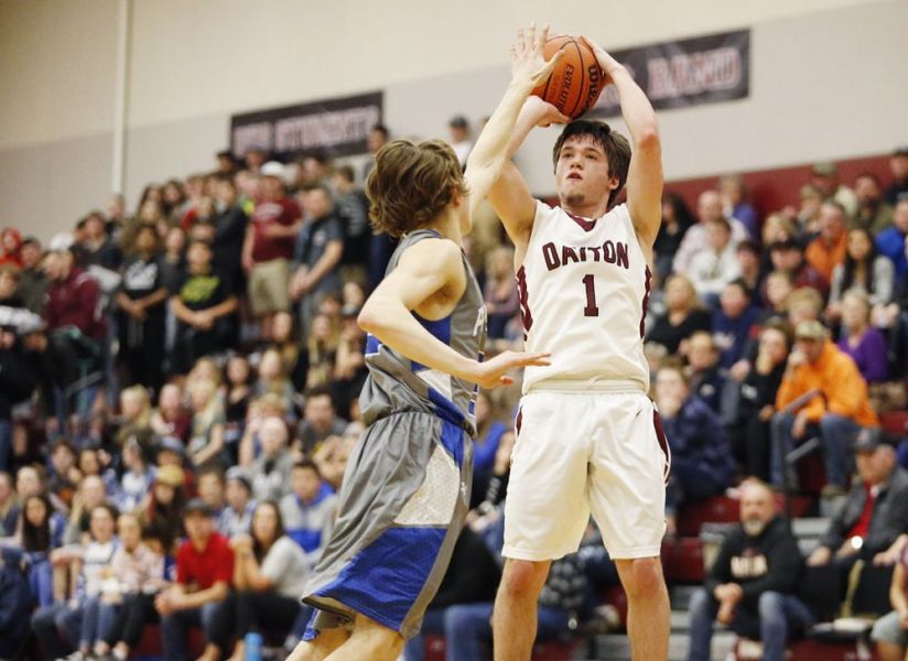 Rockne Roll/News-Register##
Dayton s Braeden Nowlin launches a corner three during the Pirates  66-60 win over Amity January 8.