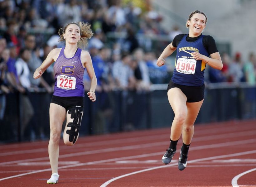 Rockne Roll/News-Register##
Sheridan s Ronni VanZant wins the girls  100m final.