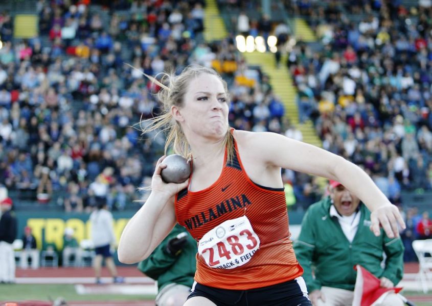 Rockne Roll/News-Register##
Hannah Hughes of Willamina pushes an attempt in the girls  shot put.