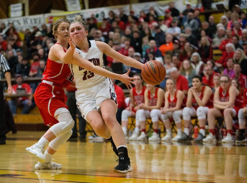 Rockne Roll/News-Register##
Dayton s Jaden Moore drives baseline against Coquille in Thursday s quarterfinal.