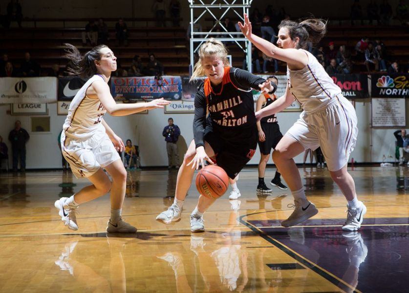 Rockne Roll/News-Register##
Yamhill-Carlton s Sadie Horne drives to the hoop against Marshfield.