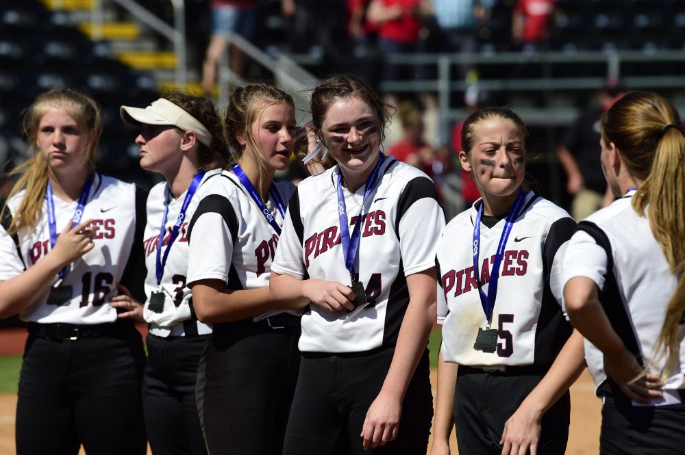 Marcus Larson/News-Register##
Dayton softball players receive their second-place medals following Friday s 10-5 loss to Clatskanie.