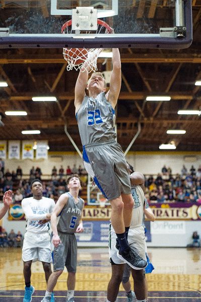 Marcus Larson/News-Register##
Amity s Josh Wart jams the ball in the hoop during the Warriors  State Championship title game.