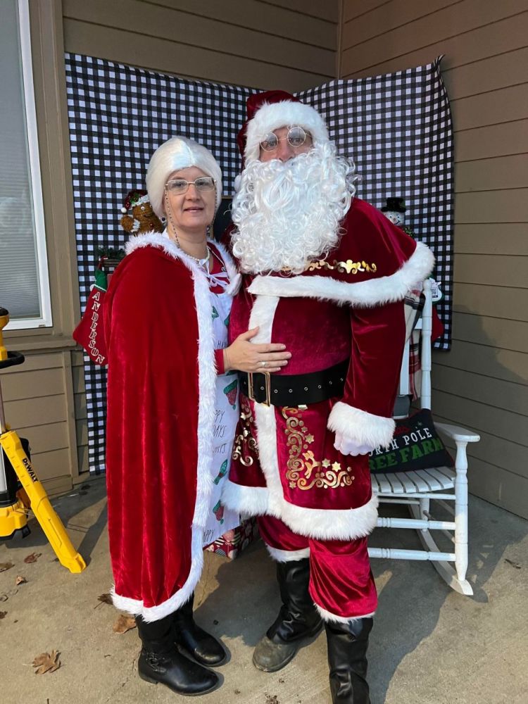 Submitted photo## Mrs. Claus and Santa, played by Yamhill-Carlton Elementary School secretary Kelli Fletcher and her husband, Don, greet children at the winter wonderland event Dec. 10 at the school.