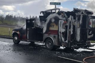 Photos courtesy West Valley Fire District##A fire engulfed a West Valley Fire District ambulance Tuesday on Highway 22 in Polk County. Photos courtesy West Valley Fire District##A fire engulfed a West Valley Fire District ambulance Tuesday on Highway 22 in Polk County.