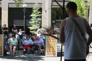 Rockne Roll/News-Register##Lunch hour temperatures already were climbing Thursday as  the Brown Bag Summer Concert Series audience sought shade while listening to the band Weather Machine at U.S. Bank Plaza in downtown McMinnville.